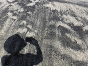 Volcanic sand shadows